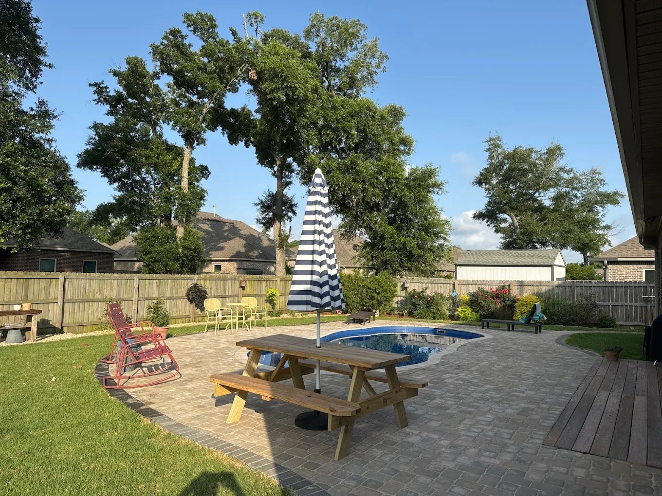 paver patio with a pool in gulfport ms